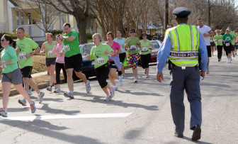 Runners jog through the Oakwood neighborhood in downtown Raleigh in February 2011. Photo by Karen Tam. 