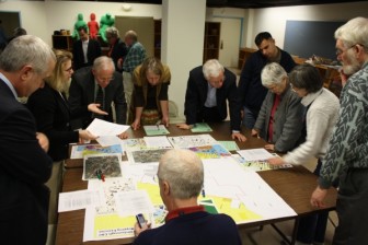 Citizens and City Officials look over UDO plans in February 2011