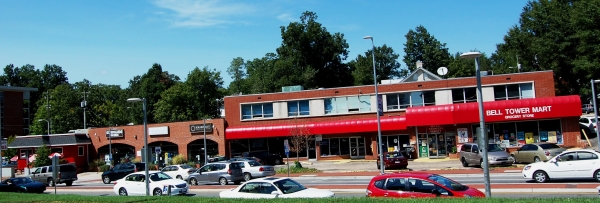 The exterior of Sadlack's Heroes and other businesses across from the N.C. State bell tower.