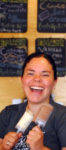 Danielle Centeno, also part owner, holds "push up pops" — ice cream made with their chocolate.