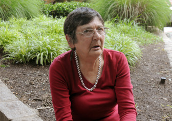 Joyce Johnson talks about the problems of the homeless as she sits in Moore Square. 