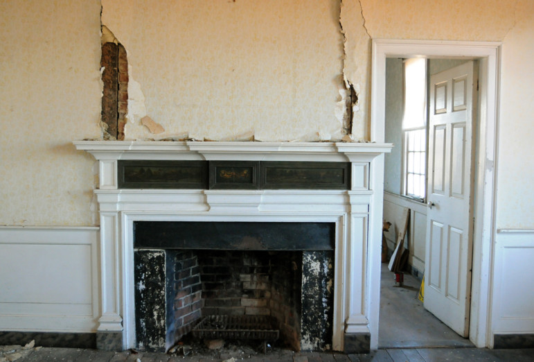The fireplace in main parlor in the oldest part of house.