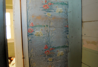 Pieces of old wallpaper can be seen throughout the house.  This one in a downstairs bathroom.