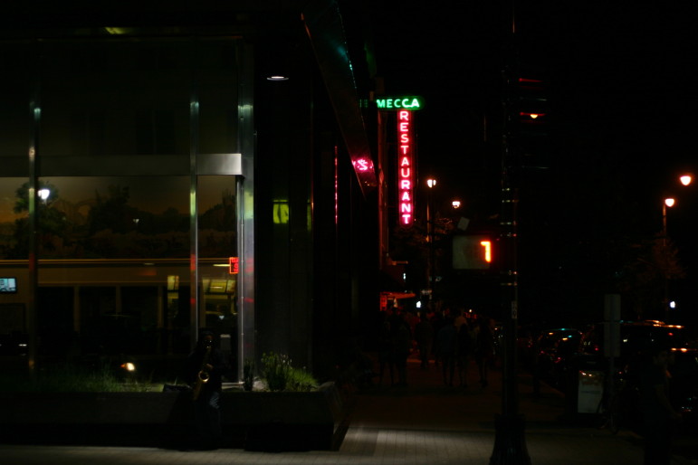 Mecca Restaurant's bright sign lights up the Raleigh night