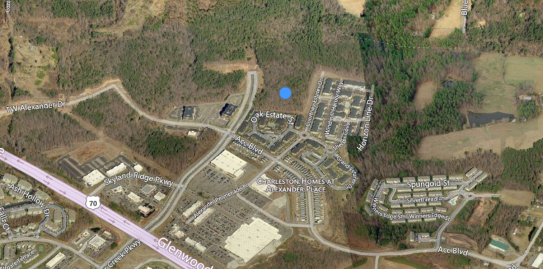 The blue dot represents the property in question