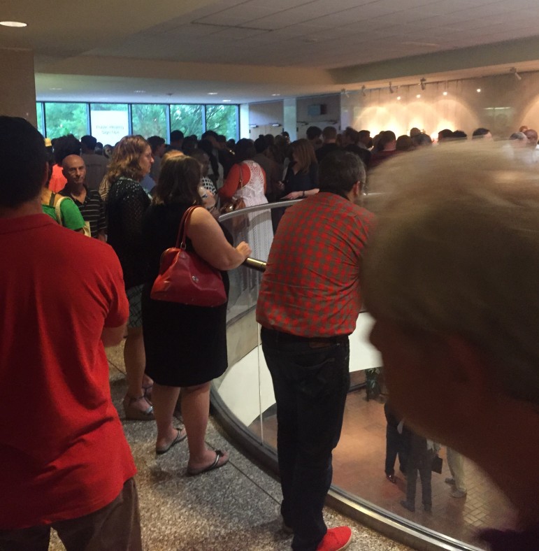 Hundreds of residents spilled out into overflow areas set up throughout city hall