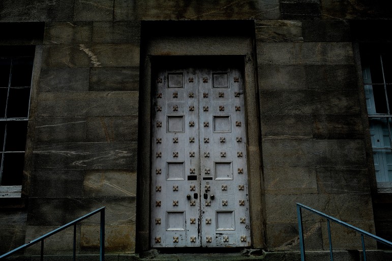 An ominous white door at the State Capitol Building that probably leads to the realm of the undead