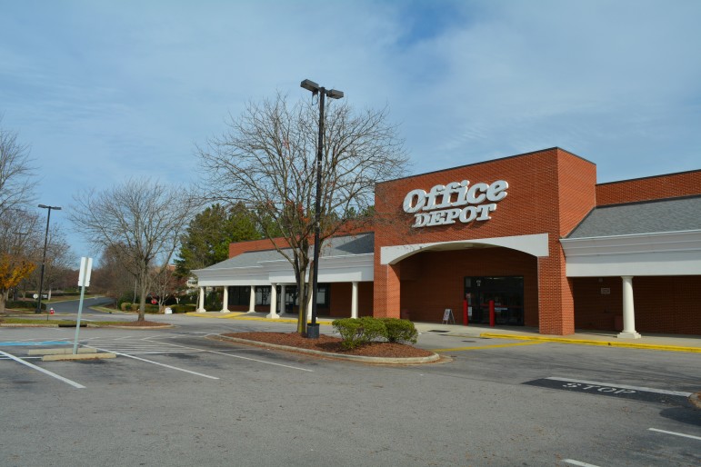 We're betting the Anytime Fitness will go into that empty spot to the left of Office Depot