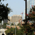 Josie Hinton walks his bike down Davie Street.