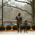 The statue of Andy and Opie stand alone Monday afternoon in the center of Pullen Park near downtown Raleigh, N.C.